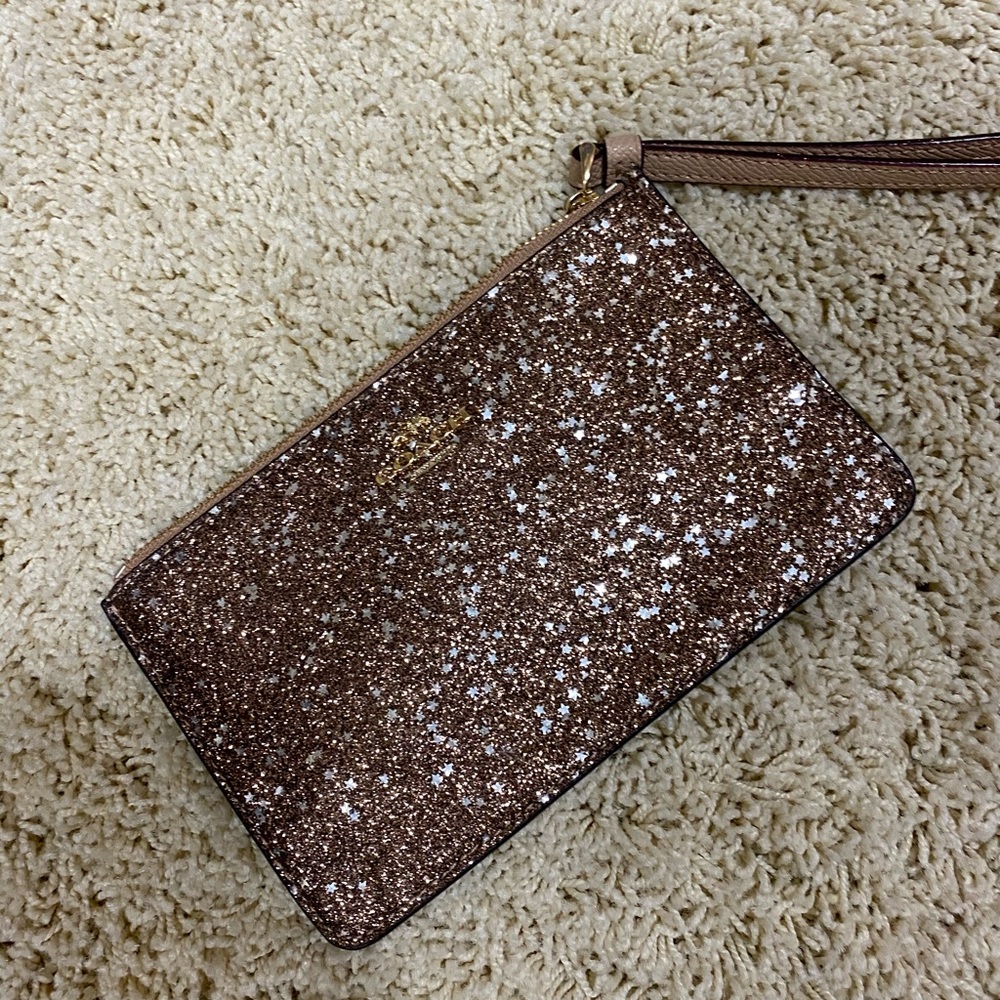 Coach wristlet rose gold